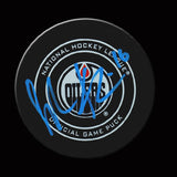 JUJHAR KHAIRA Autographed Goal Puck With CONNOR MCDAVID Assist Vs. Calgary Flames