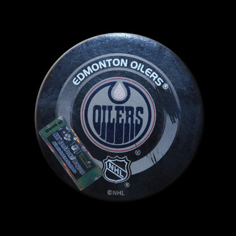 Edmonton Oilers vs Anaheim Mighty Ducks Game Used Puck February 2, 2004