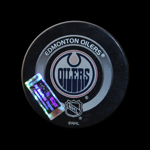 Edmonton Oilers vs Vancouver Canucks Game Used Puck February 21, 2004