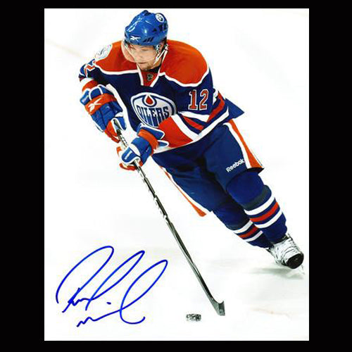 Robert Nilsson Edmonton Oilers Autographed Puck Action 8x10 Photo - Clearance