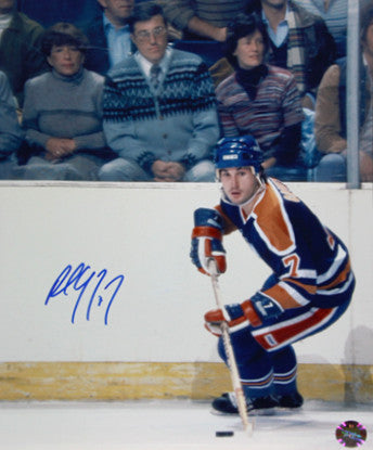 Paul Coffey Edmonton Oilers Autographed 11x14 Puck Action Photo