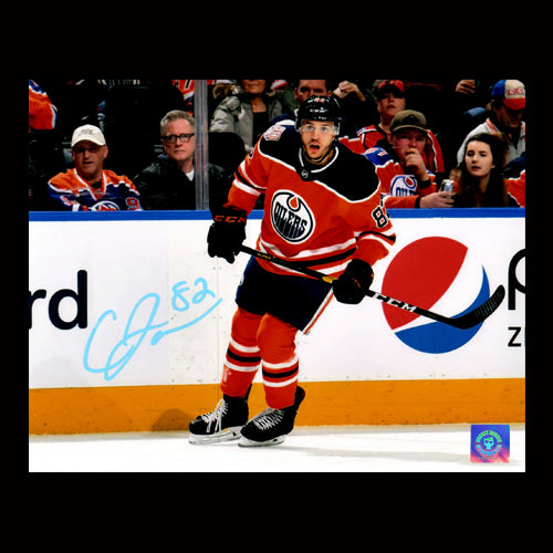 Caleb Jones Edmonton Oilers Autographed Action 8x10 Photo - Clearance