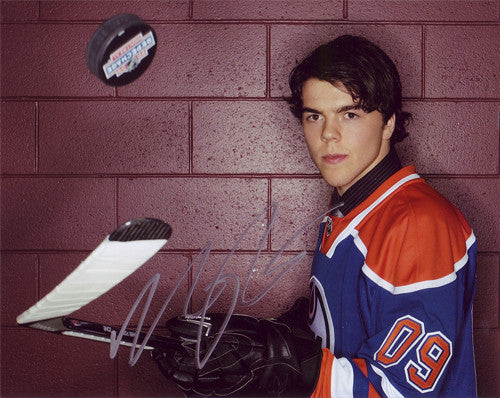 Magnus Paajarvi Edmonton Oilers Autographed Draft Day Puck 8x10 Photo - Clearance